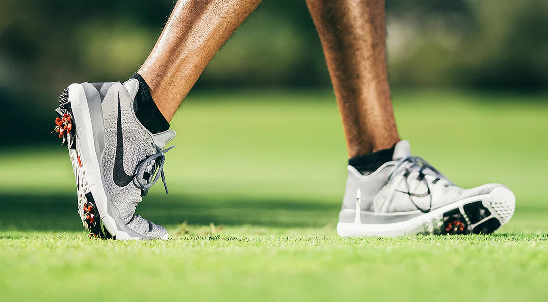 write a blog about The Advantages of Spiked vs. Spikeless Golf Shoes