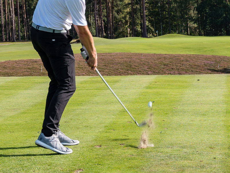 write a blog about The Benefits of Custom Fitted Irons: Why They Can Improve Your Game