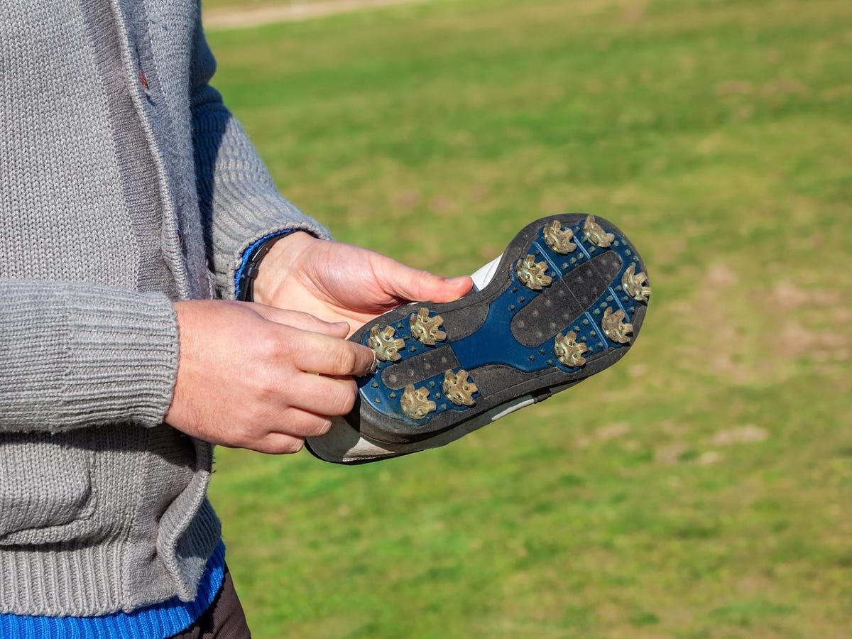 write a blog about The Best Golf Shoes for Traction on Hilly Courses